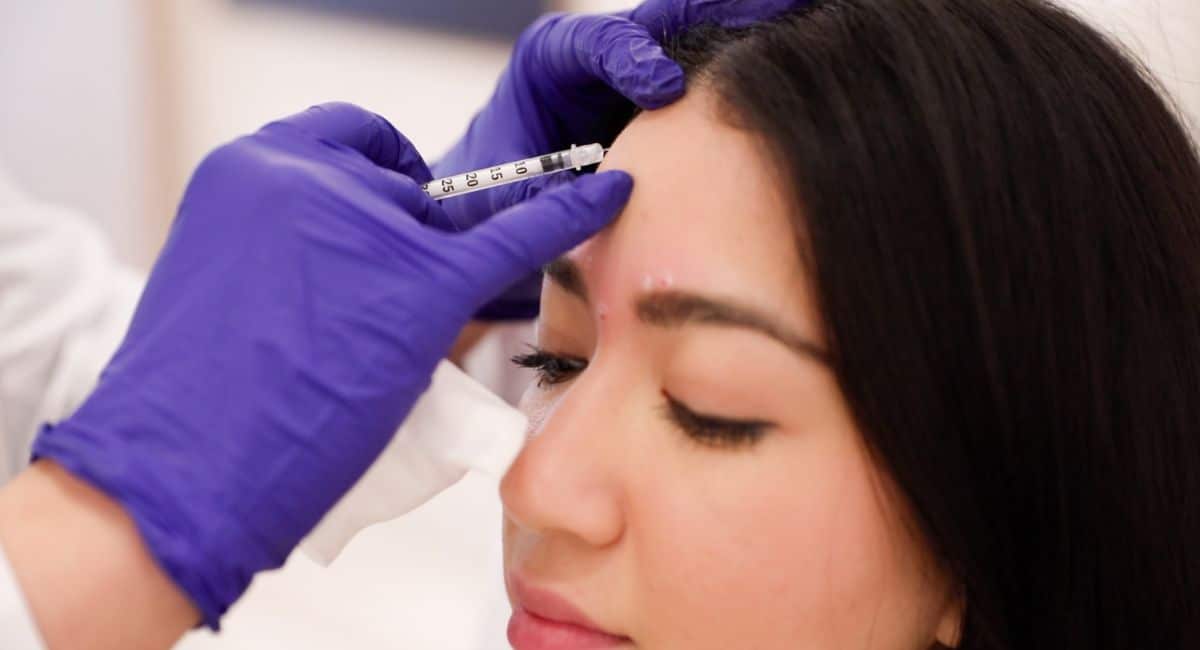 A woman is receiving a Botox profhilo injection at Skinney Medspa in New York City.