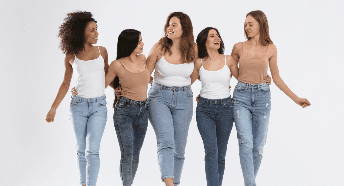 group of women with different body types on light background