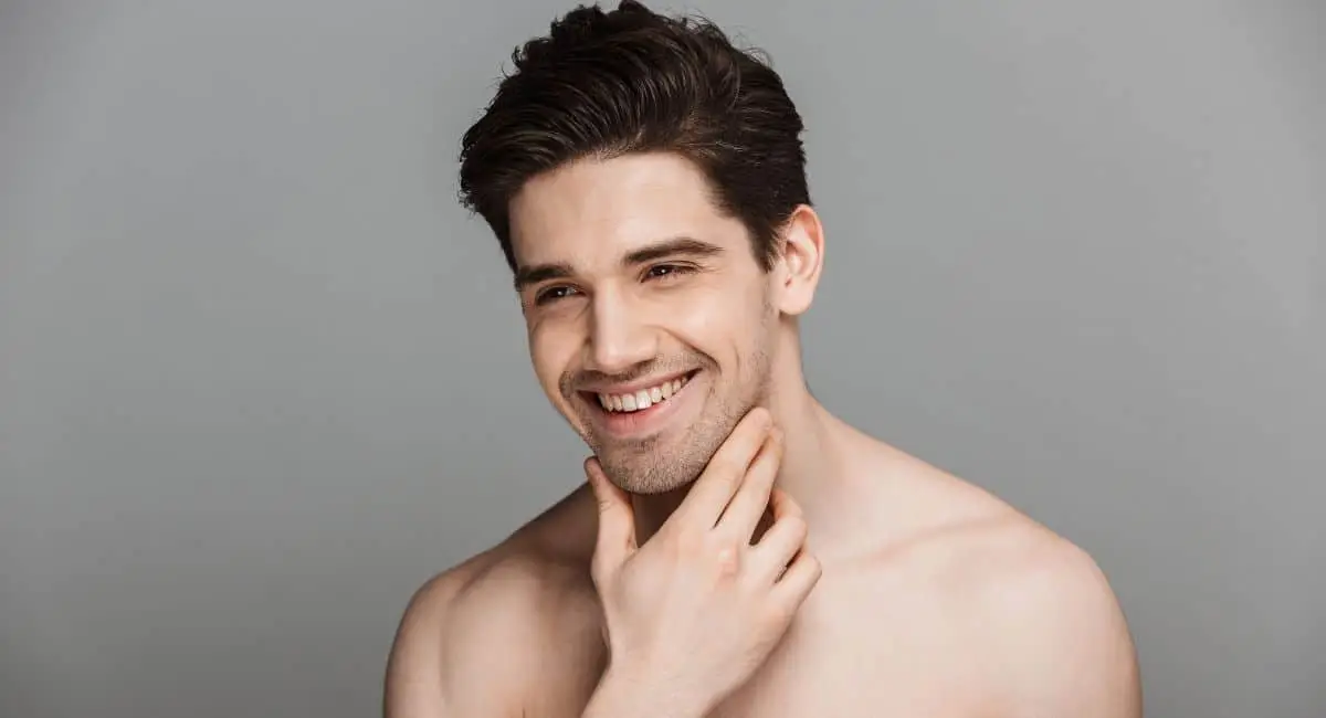 a charming man touched his chin