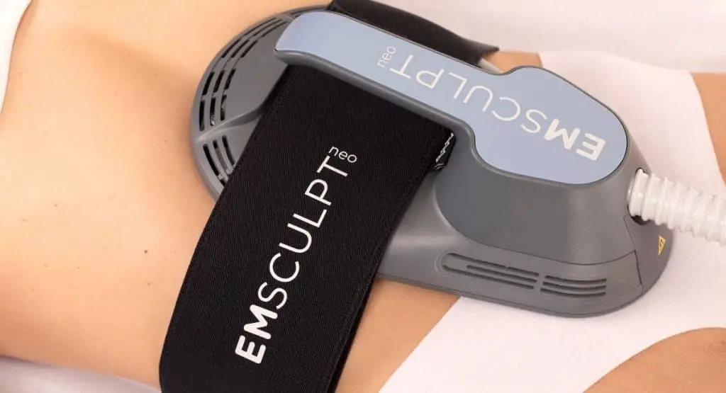A woman's abdomen is treated with EMsculpt at Skinney Medspa in New York City.